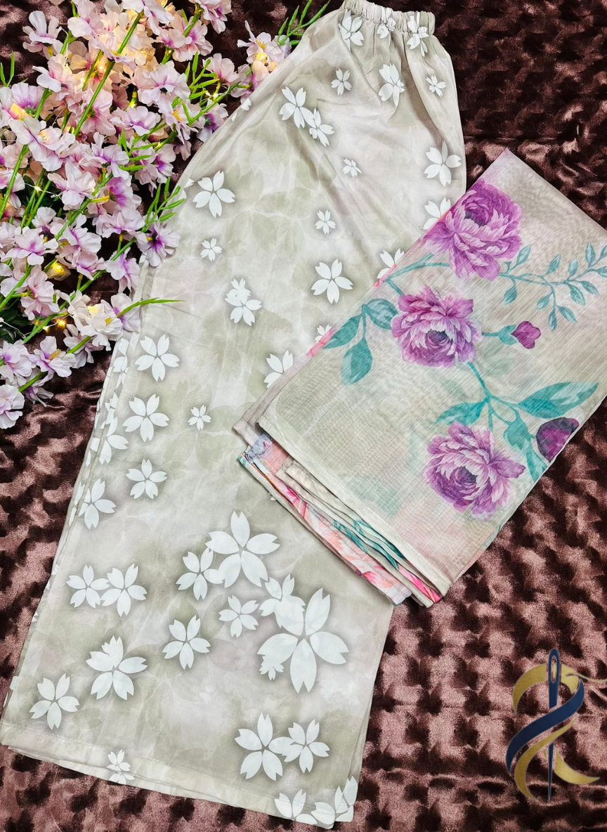 floral 3-piece stitched suit in medium size, Raw silk shirt and trouser paired with a chiffon–tissue mix dupatta.